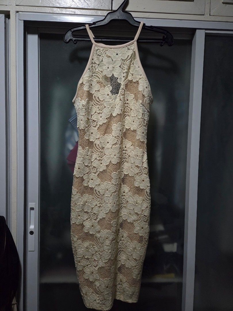 Entry Lace Dress (Category: Dresses) located in Pasig City. Submitted by ldcayas (Listing ID 1467131041, Image 1). Description: - Brand: Entry - Condition: Brand new with tags still attached - Size: Medium - Color: Beige with nude lining - Design: Floral lace pattern throughout with a back keyhole cutout and button closure Mode of Payment Gcash/ Bank Transfer.