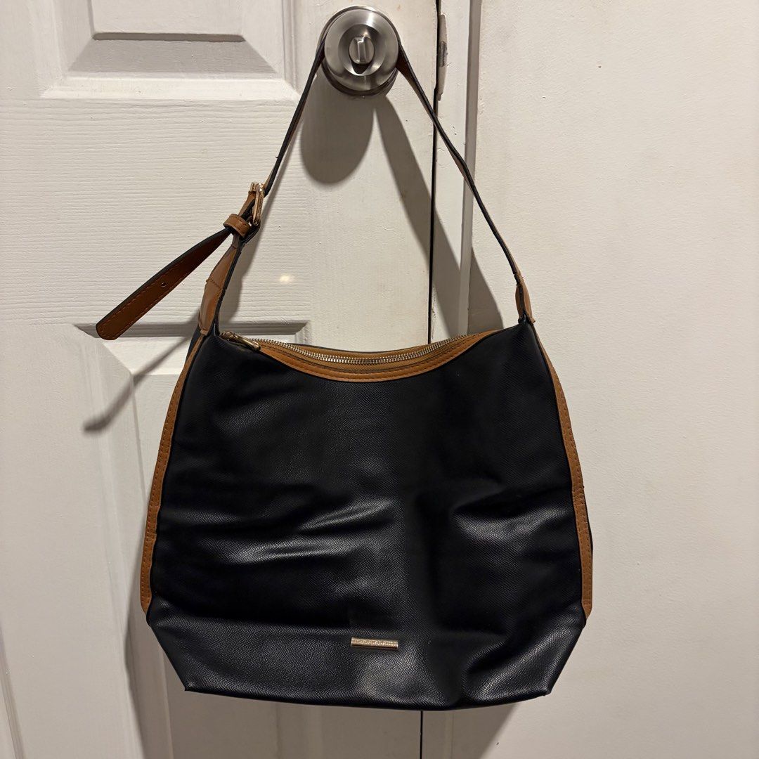 Eve & Adam Marga Hobo Bag (Category: Shoulder Bags) located in Manila. Submitted by sade03_ (Listing ID 1466981295, Image 1). Description: —Material: Vegan leather —Dimensions: 12” × 5.25” × 11” | 31 x 13 × 28cm —Exterior: zip top closure, adjustable strap —Interior: 1 zipper pocket, 4 slip-on pockets —Inclusions: dust bag —Ways to wear: tote, shoulder bag.