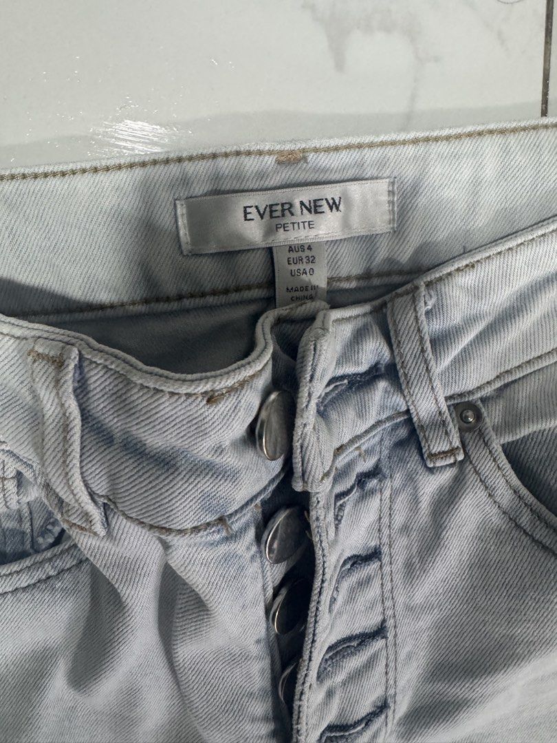 Ever New Petite Light Wash Button-Fly Denim Jeans (Category: Jeans) located in Manila. Submitted by decluterthings888 (Listing ID 1467167688, Image 2). Description: - Brand: Ever New Petite - Style: Light wash denim jeans with cropped straight leg silhouette - Closure & Details: Button-fly with metal hardware, classic 5-pocket styling, and waistband belt loops - Size: AUS 4 / EUR 32 / USA 0 - Origin: Made in China - Condition: Excellent, well-mai