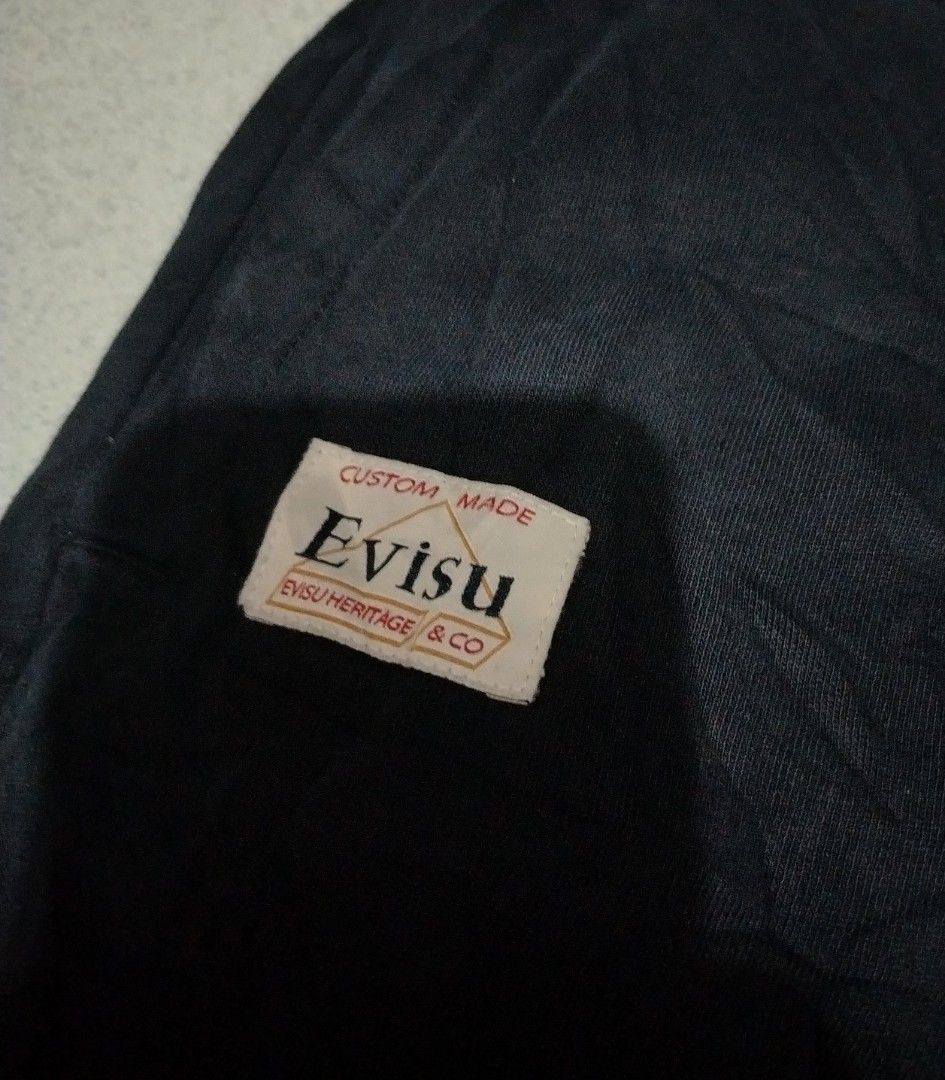 Evisu Daicock (Category: Joggers) located in Bocaue. Submitted by adrianberi35876 (Listing ID 1467126689, Image 3). Description: Evisu Daicock Waist:32 - 37 Length:38.5 Color Rate:9/10 Good Condition Issue:Sign of usage sa hem & minimal cracks sa front design and sa back check the last 3 photo Mine:500 free sf Bocaue,Bulacan.