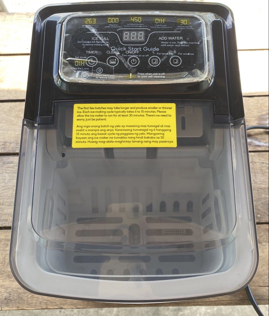 EYSIN Countertop Stainless Steel Ice Maker Machine (Category: Refrigerators and Freezers) located in Baguio. Submitted by thrift_bonita (Listing ID 1466995058, Image 2). Description: EYSIN stainless steel countertop ice maker. Digital control panel on top with timer, clean, and size settings. Includes warning stickers and troubleshooting guide on the side panel. Standard plug attached. Great for kitchen counters, parties, or home bars. Fast ice p
