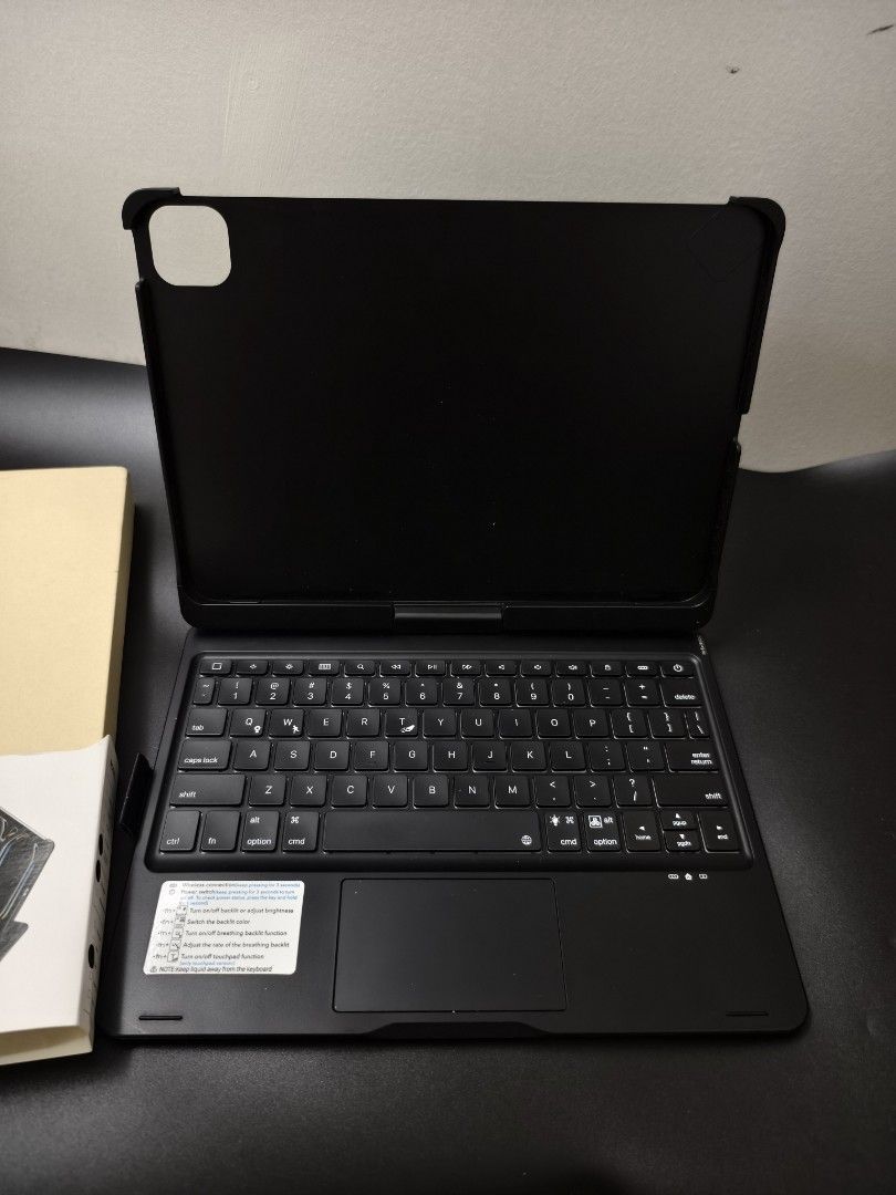 F360 Wireless Keyboard Case for iPad 10.9/11 inch (Category: Cases & Sleeves) located in Angeles City. Submitted by measaliman02351 (Listing ID 1467082787, Image 3). Description: - Compatibility: Fits iPad 10.9 and 11-inch models - Design: Black keyboard folio with 360-degree rotation structure - Features: Built-in trackpad and adjustable backlit keys - Condition: Clean, tested, and fully functional - Inclusions: Comes with original retail box - 