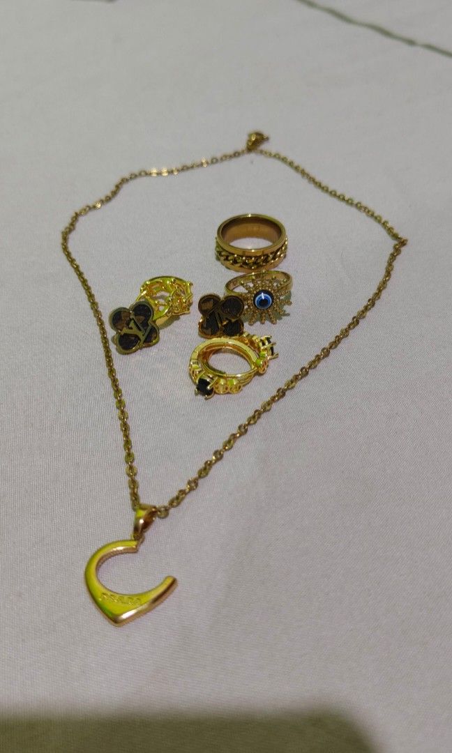 fashion jewelry (Category: Earrings) located in Las Pinas. Submitted by anne1411 (Listing ID 1467061999, Image 1). Description: necklace, earring, ring. take all. non tarnish..