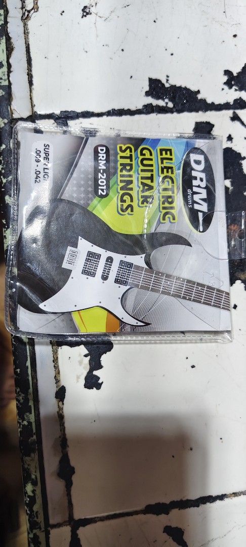 Fender & DRM Guitar Strings and Yamaha Drumsticks (Category: Musical Instruments) located in Pasig City. Submitted by tupriomichaeljohn (Listing ID 1467098213, Image 3). Description: - Fender 80/20 Bronze Acoustic Guitar Strings: ₱100/set - DRM Electric Guitar Strings: ₱100/set - Yamaha Wood Drumsticks: ₱50/pair - Brand: Metro Music Supply.