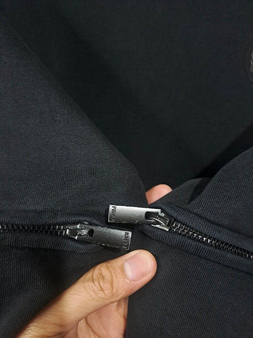 Fendi "Bag Bugs" Monster Line (Category: Luxury Apparel) located in Quezon City. Submitted by yaseen73 (Listing ID 1467163993, Image 3). Description: Authentic Fendi Monster Line "Bag Bugs" SweatShirt Dark Gray CrewNeck 2013 Made in Italy - Medium - Width 22 - Length 27 - Carpetize Sleeve Logo - Heavy Weight - Zippered Sleeve Details Yellow and White Eye Accent - 9.5/10 Color Rate - With Minimal Marks of Usage But Not Barely Visible - Pre Owned -