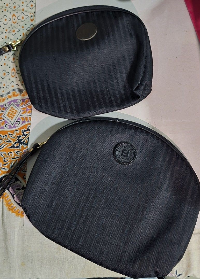 Fendi Black Striped Pouch Cosmetic Bag (Category: Luxury Bags & Wallets) located in Imus. Submitted by gilosotnas316 (Listing ID 1467036162, Image 2). Description: Fendi black striped monogram canvas and leather cosmetic or vanity pouches/wristlets..