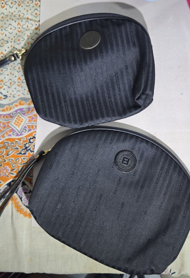 Fendi Black Striped Pouch Cosmetic Bag (Category: Luxury Bags & Wallets) located in Imus. Submitted by gilosotnas316 (Listing ID 1467036162, Image 1). Description: Fendi black striped monogram canvas and leather cosmetic or vanity pouches/wristlets..