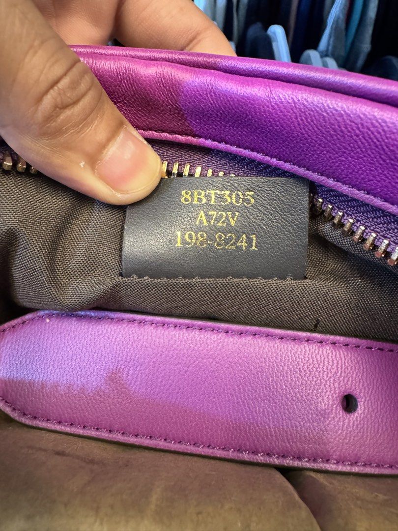 Fendi Purple Leather Shoulder Bag (Category: Luxury Bags & Wallets) located in Manila. Submitted by selection_apparel.ph (Listing ID 1467065541, Image 3). Description: - Authentic Fendi shoulder bag in vibrant purple leather - Elegant gold-tone hardware and signature embossed FF pattern - Chic chain strap with a structured shape and front slip pocket - Secure zipper closure opening to a clean interior lining - Includes Fendi Made in Italy label a