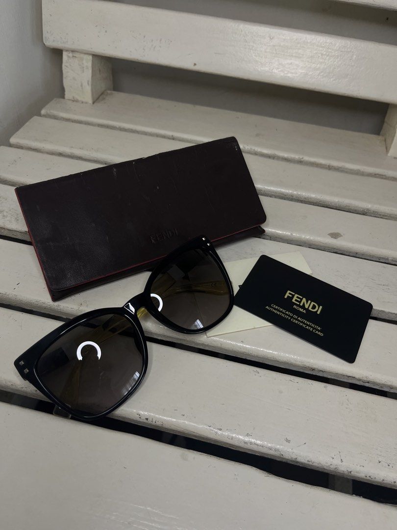 Fendi Square Color-Block Acetate Sunglasses (Category: Sunglasses & Eyewear) located in Iloilo. Submitted by selectionsbykat (Listing ID 1467101977, Image 2). Description: guaranteed authentic store bought in Canada original price was around P20k; used only a couple of times - Brand: Fendi - Model: FF 0098/F/S - Color/Design: Black frames with gradient tinted lenses and stylish striped temple details - Origin: Made in Italy - Inclusions: Original