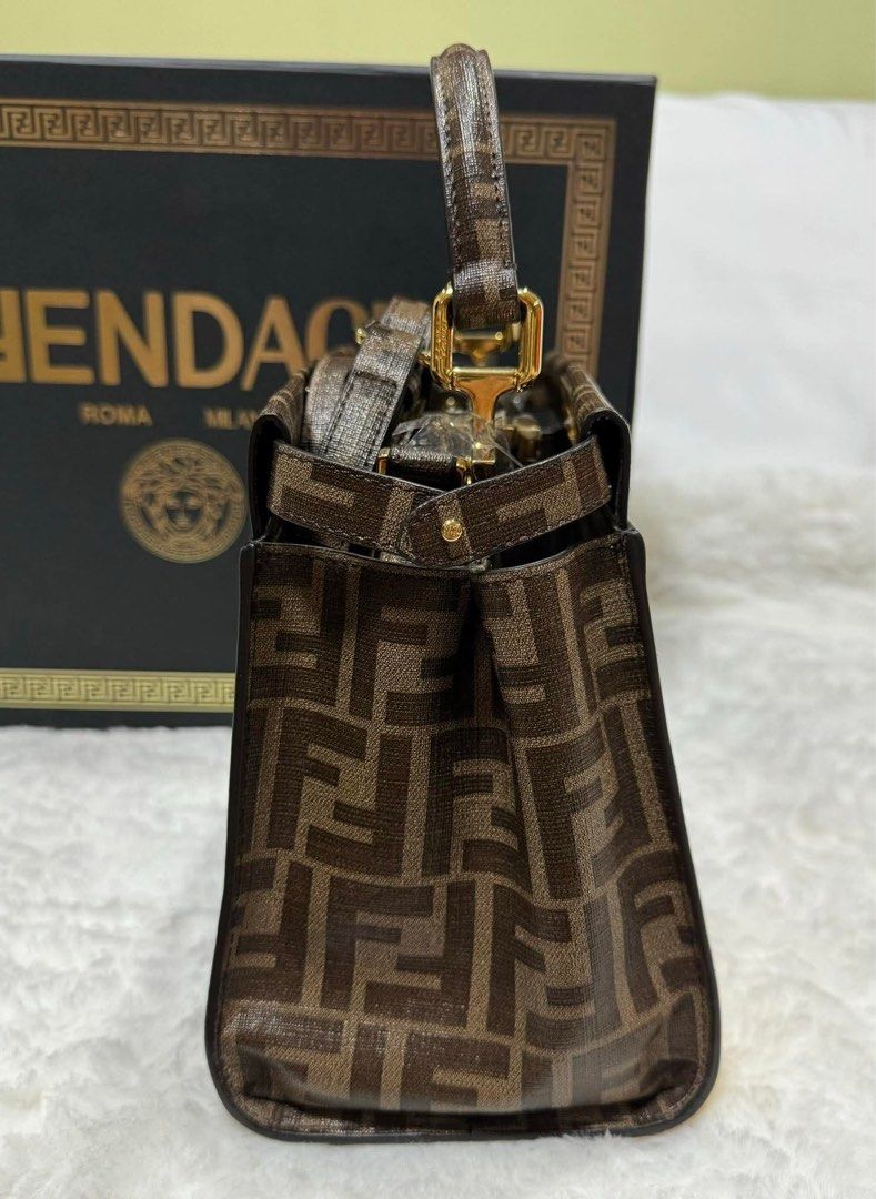 Fendi X Antonio Lopez Peekaboo (Category: Luxury Bags & Wallets) located in Manila. Submitted by jdywatches88 (Listing ID 1467025432, Image 3). Description: Fendi X Antonio Lopez Peekaboo handbag featuring the iconic brown Zucca canvas and a colorful pop-arr leather graphic.