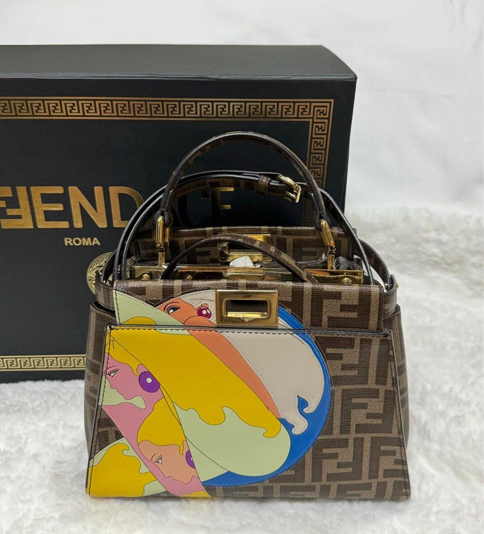 Fendi X Antonio Lopez Peekaboo (Category: Luxury Bags & Wallets) located in Manila. Submitted by jdywatches88 (Listing ID 1467025432, Image 1). Description: Fendi X Antonio Lopez Peekaboo handbag featuring the iconic brown Zucca canvas and a colorful pop-arr leather graphic.