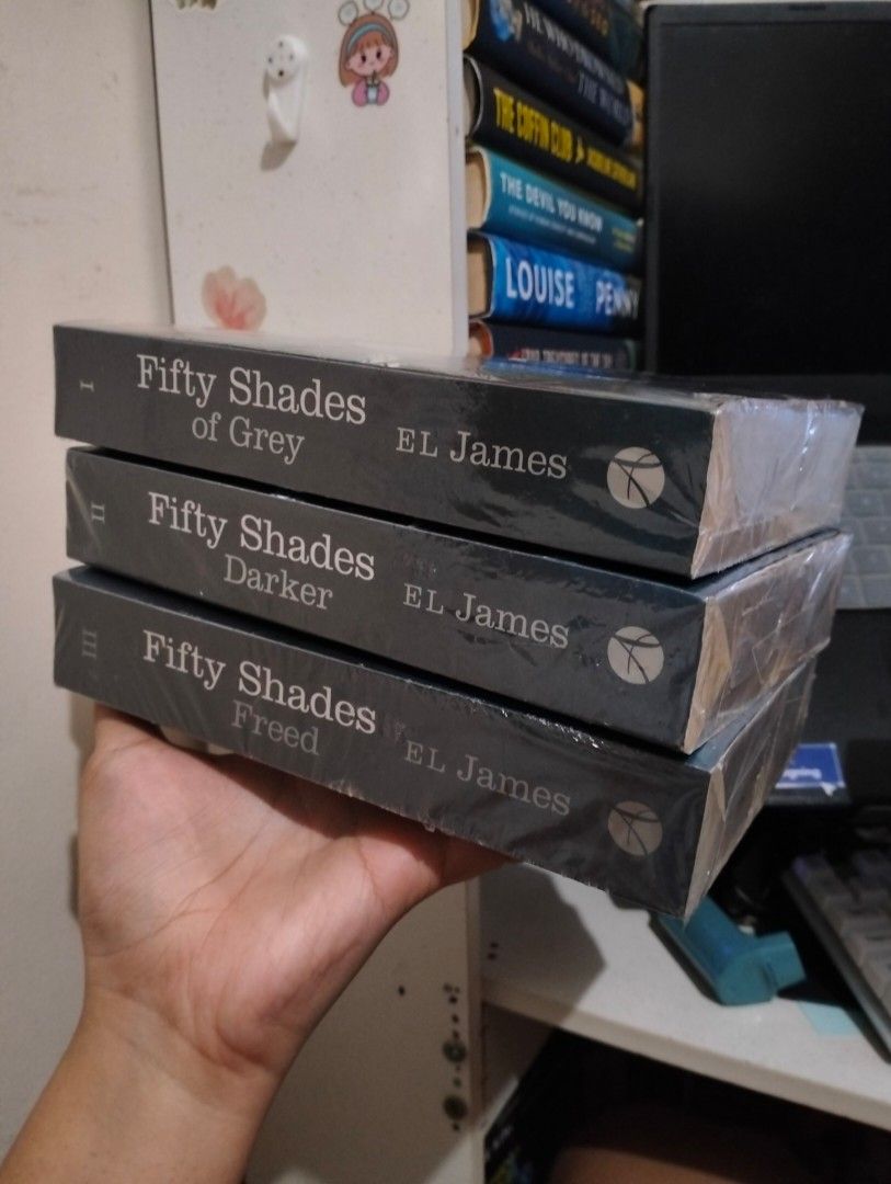 Fifty Shades Trilogy by E.L. James Box Set (Category: Storybooks) located in Batangas. Submitted by maryadims0707_819 (Listing ID 1467093415, Image 1). Description: - Complete 3-book trilogy set: Fifty Shades of Grey, Fifty Shades Darker, and Fifty Shades Freed - Brand new and unopened with original shrink-wrap intact - Paperback editions featuring sleek grey covers and white typography - Perfect addition to any romance collection or bookshelf - 