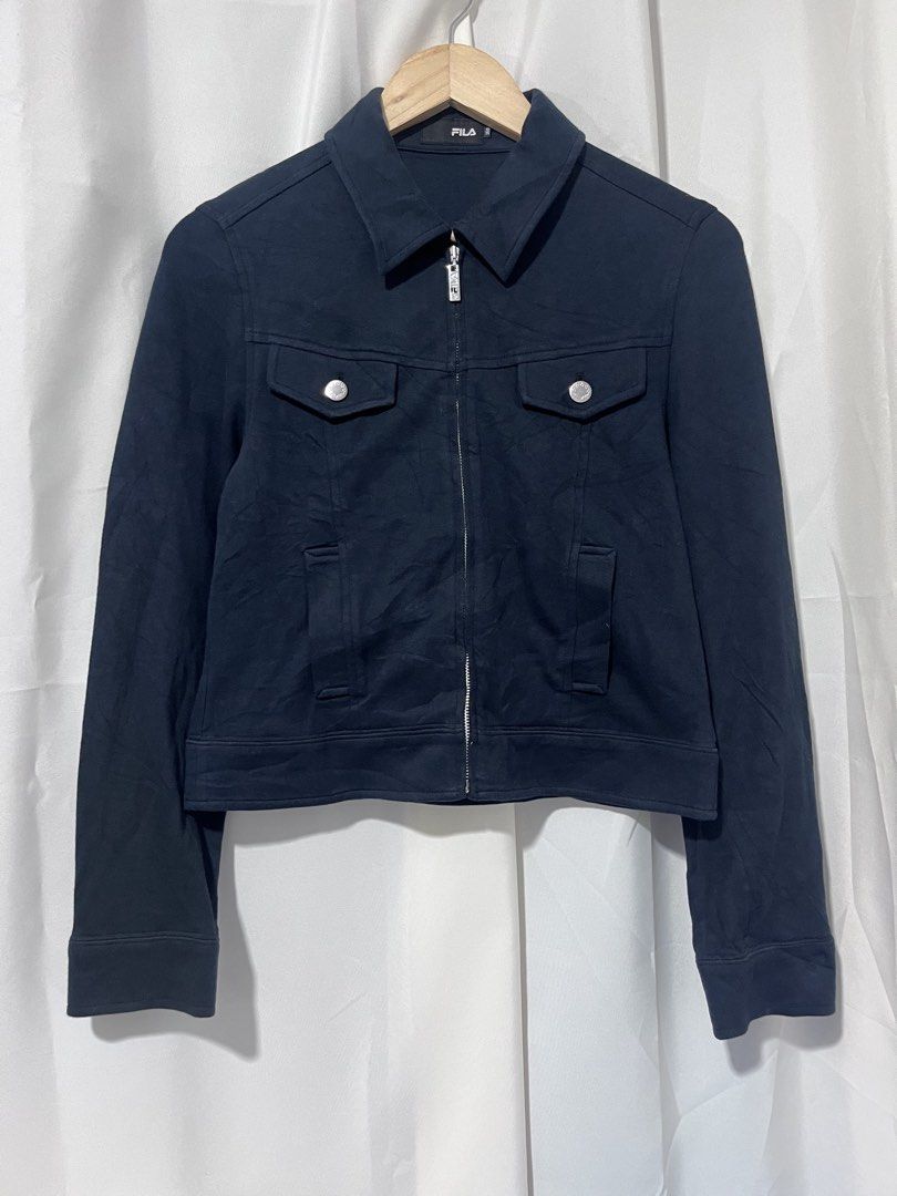 Fila Black Zip Up Jacket Size 160 (Small) (Category: Coats, Jackets and Outerwear) located in Baguio. Submitted by miisthyshop.ph (Listing ID 1467130551, Image 1). Description: - Brand: Fila - Color: Black - Size: 160 (fits Small) - Style: Zip-up jacket with classic collar and front buttoned chest pockets - Details: Custom Fila zipper pull and inner red, white, and blue stripe trim along the hem - Condition: Excellent pre-loved condition, clean a