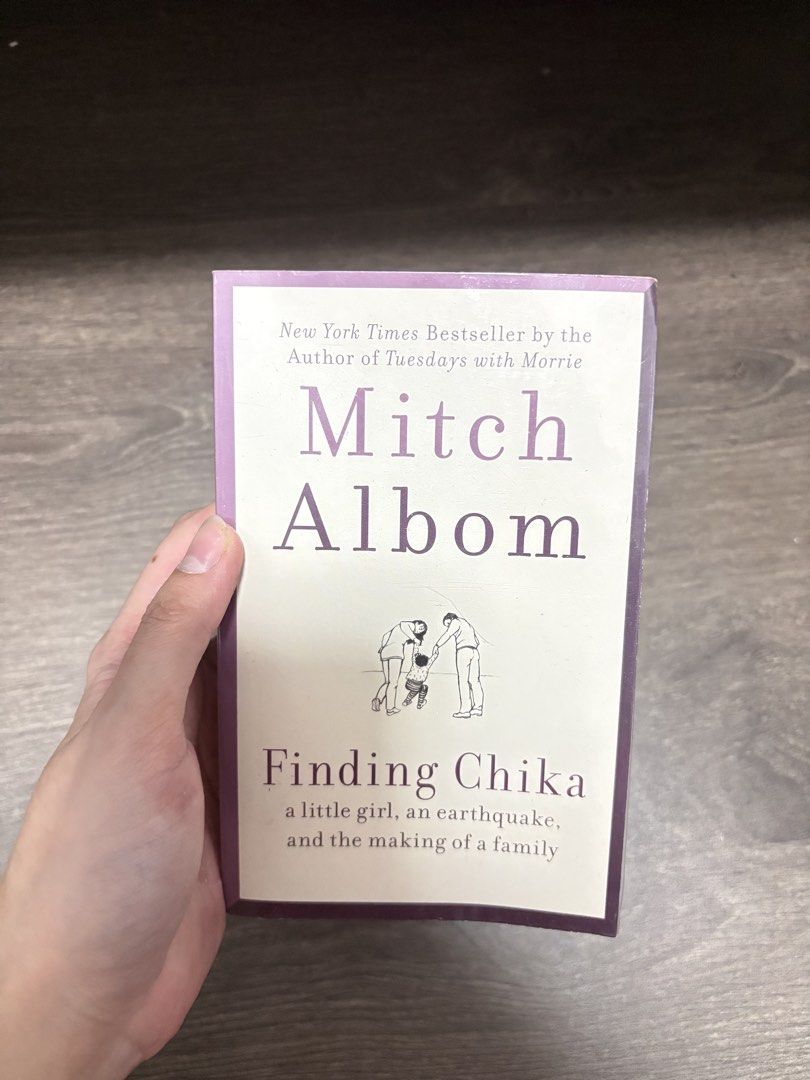 Finding Chika by Mitch Albom paperback memoir (Category: Storybooks) located in Imus. Submitted by _monicakes (Listing ID 1467097951, Image 1). Description: - Title: Finding Chika by Mitch Albom - Genre: Nonfiction / Memoir - Condition: Readable copy with mild yellowing from storage; spine is fully intact - Summary: A heartwarming and touching true story about a little girl from Haiti and the earthquake - Perfect for: Fans of inspiring and emotio