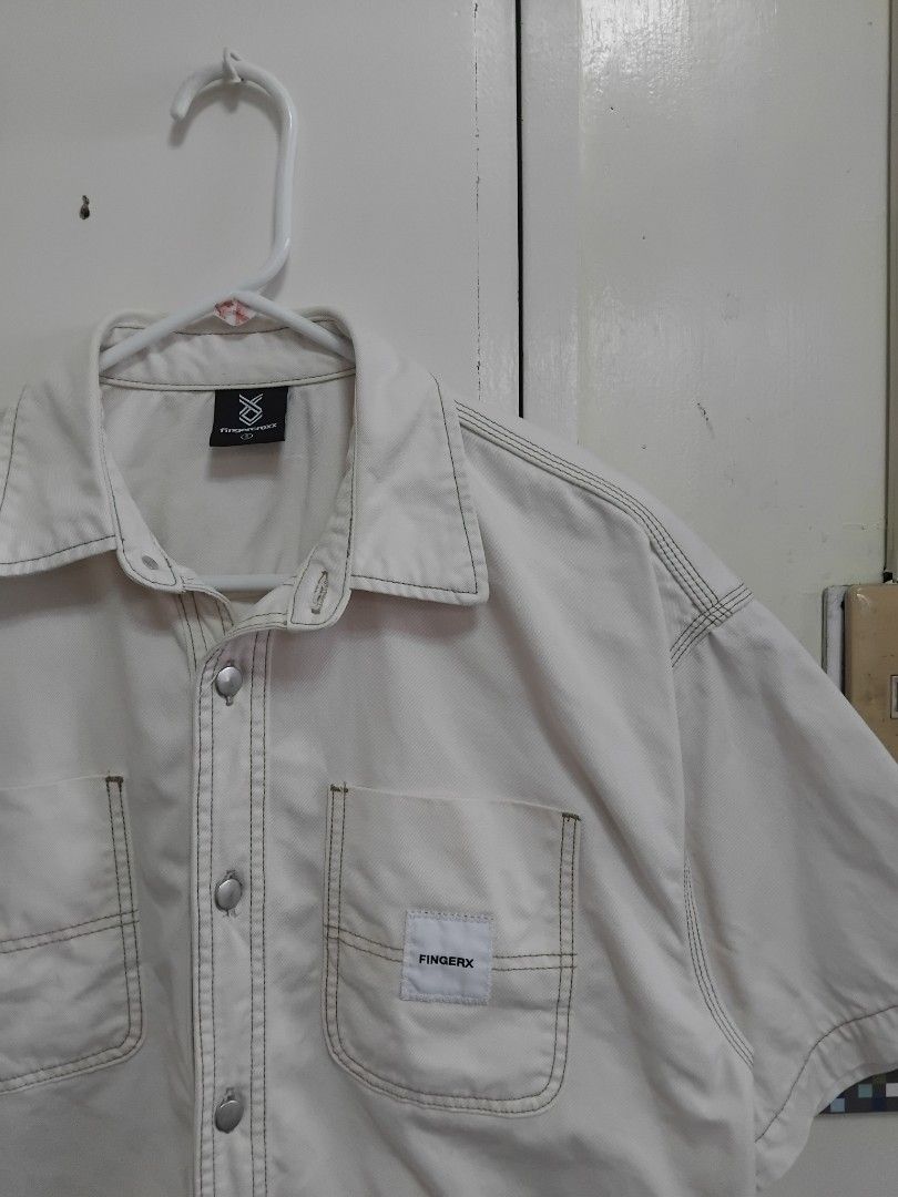 Fingercroxx HK Oversized Utility Denim Work Shirt (Category: Tshirts & Polo Shirts ) located in Pasig City. Submitted by hustlexcurate (Listing ID 1467010049, Image 3). Description: Fingercroxx HK Oversized Utility Denim Work Shirt Size S on tag fits LARGE Dimensions: 24X28.