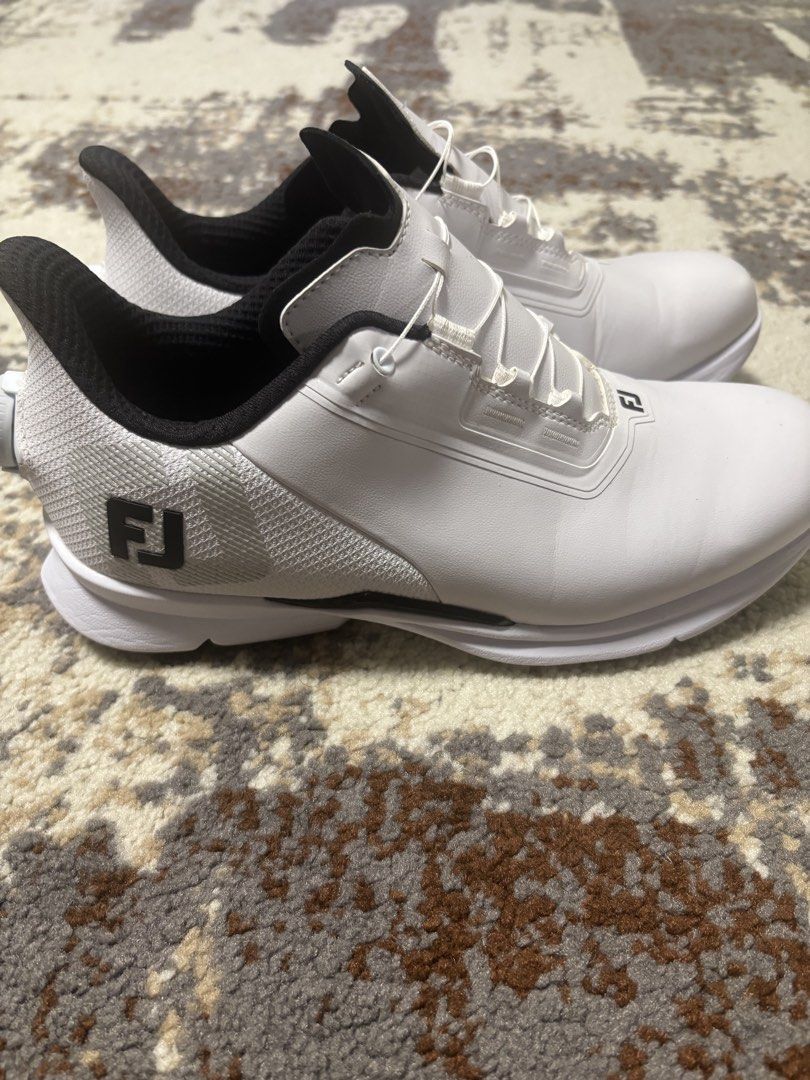 FJ golf shoes (Category: Golf) located in Taguig. Submitted by christianlacsa (Listing ID 1467166522, Image 1). Description: FJ spikeless shoes Size 9 Bought in vietnam .