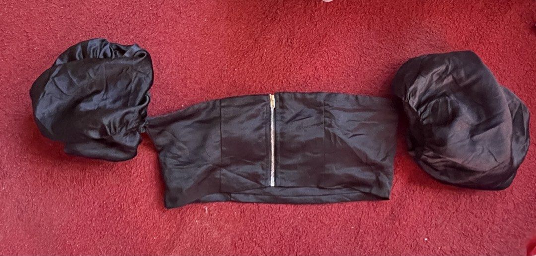 Forever 21 Black Satin Crop Top Size M (Category: Blouses) located in Toledo. Submitted by klnmia (Listing ID 1466974689, Image 1). Description: - Brand: Forever 21 - Condition: Brand new with tags still attached - Size: Medium (M) - Color & Material: Black, lightweight silky satin - Design: Center front silver zipper and trendy off-shoulder puff sleeves.