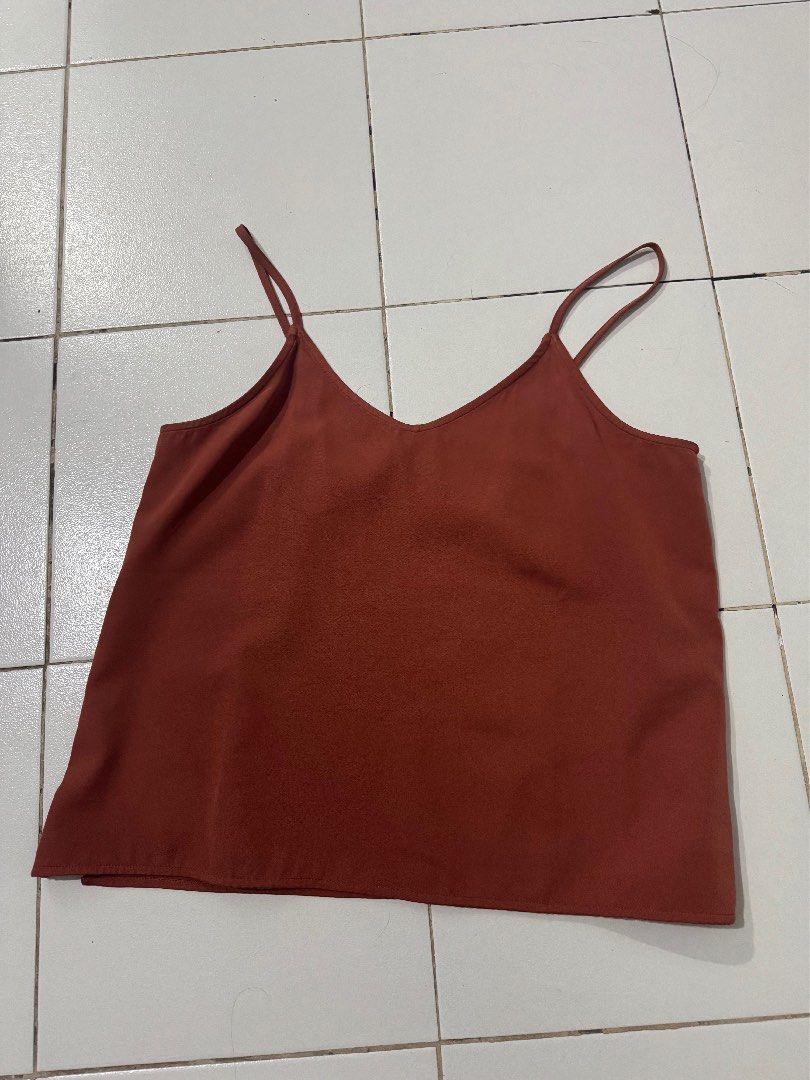 Forme Brown Spaghetti Strap Cami Top Size L (Category: Sleeveless) located in Pasig City. Submitted by pmlmri (Listing ID 1467155929, Image 1). Description: - Brand: For me - Item: Brown cami top - Size: L / EUR 40 / UK 12 - Details: Thin spaghetti straps, v-neckline, simple casual style - Condition: Clean, no stains or damage - Origin: Made in the Philippines Mode of Shipping: J&T or Lalamove Mode of Payment: Gotyme/BPI/Gcash .