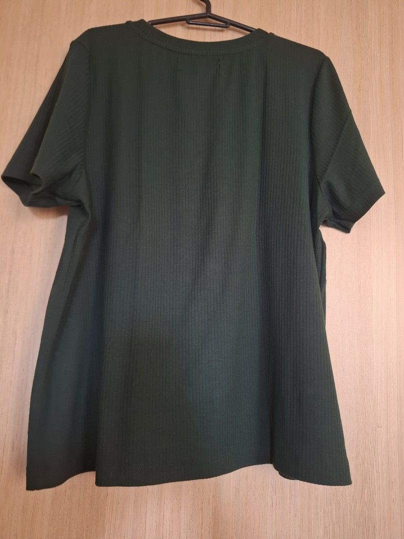 Forme Reforme Dark Green Blouse (Category: Shirts) located in Rizal. Submitted by mirisica (Listing ID 1467136374, Image 2). Description: - Brand/Style: Forme dark green ribbed t-shirt - Size: XL - Design: Embroidered 'Every Moment Matters' quote with small star accents - Details: Short sleeves, crew neck - Fit/Feel: Comfortable everyday top - Condition: Excellent pre-loved condition - Used twice.