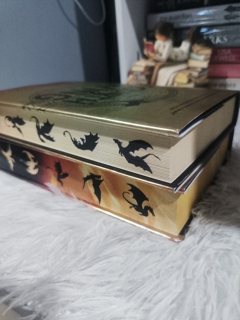 Fourth Wing and Iron Flame Deluxe Edition Hardcovers (Category: Storybooks) located in Cabuyao City. Submitted by chaptersandwonders143 (Listing ID 1467069804, Image 3). Description: - Fourth Wing & Iron Flame Special Edition Hardcovers - Stunning custom sprayed edges with dragon artwork - Excellent shelf condition, carefully maintained - Rare find as a complete set.