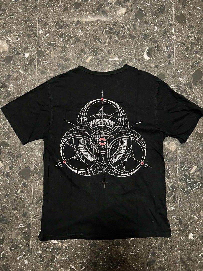 FRAGMENT DESIGN x INNERSECT (Category: Tshirts & Polo Shirts ) located in San Fernando. Submitted by _jaximus (Listing ID 1467140151, Image 2). Description: - Brand: Fragment Design x Innersect - Color: Black - Size: Large - Material: 100% cotton (Made in China) - Design: Biohazard graphic on back with matching distressed patch on chest - Details: Custom branded neck tag.