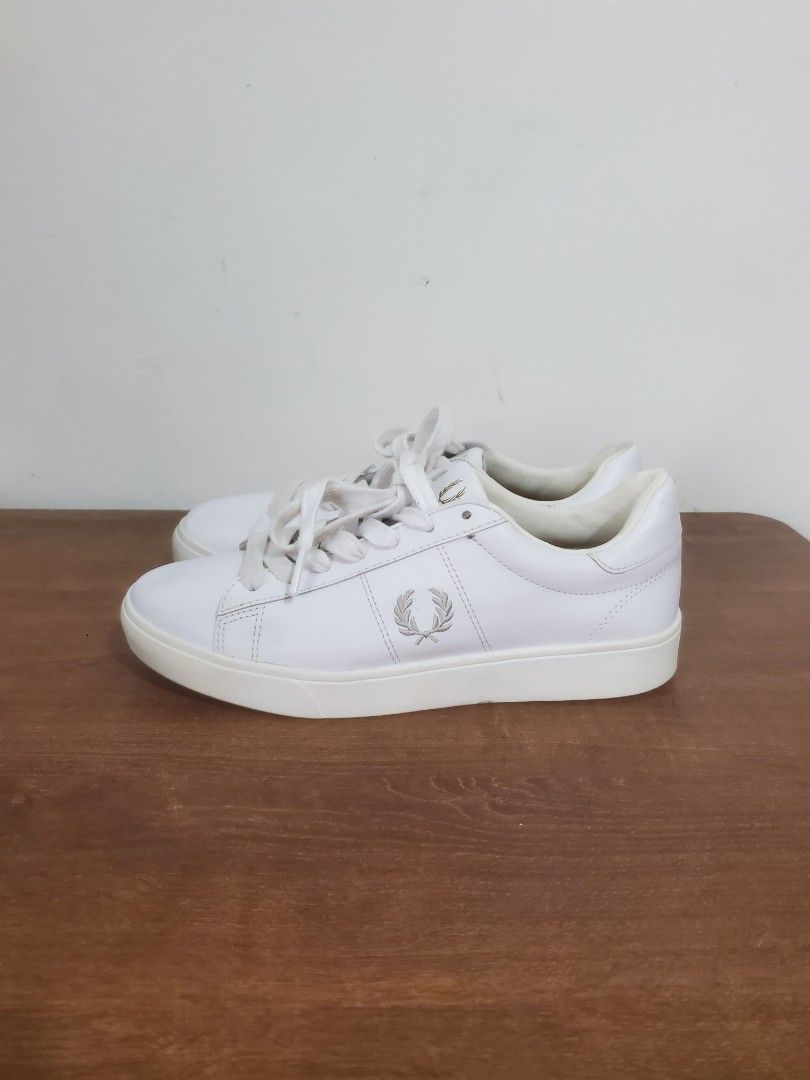Fred Perry white leather sneakers size UK 5 (Category: Sneakers) located in Manila. Submitted by royalrabbit.7b2a11 (Listing ID 1467029314, Image 2). Description: - Brand: Fred Perry - Style: Clean minimal white leather sneakers with classic embroidered laurel wreath and chunky soles - Size: UK 5 / EU 38 / US 7 - Condition: Normal signs of wear on soles and uppers - Perfect classic everyday casual shoes.