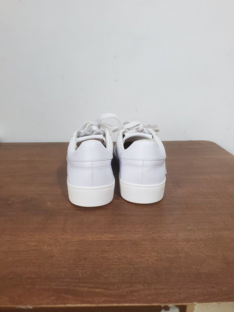 Fred Perry white leather sneakers size UK 5 (Category: Sneakers) located in Manila. Submitted by royalrabbit.7b2a11 (Listing ID 1467029314, Image 3). Description: - Brand: Fred Perry - Style: Clean minimal white leather sneakers with classic embroidered laurel wreath and chunky soles - Size: UK 5 / EU 38 / US 7 - Condition: Normal signs of wear on soles and uppers - Perfect classic everyday casual shoes.