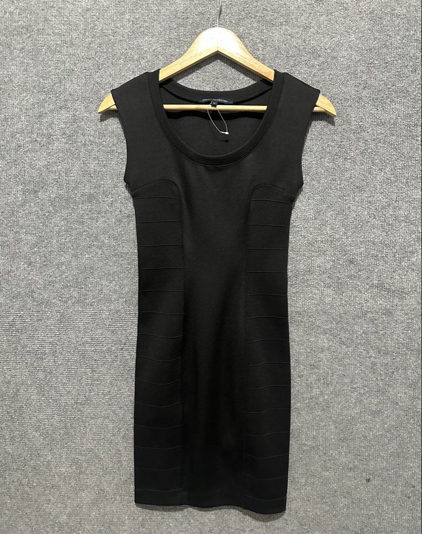 French Connection Black Bodycon Dress (Category: Dresses) located in Villasis. Submitted by justinramosonfb (Listing ID 1467116476, Image 1). Description: - Brand: French Connection - Style: Sleeveless scoop neck bodycon dress - Color: Classic Black - Size: Tag 6 - Design Details: Unique horizontal ribbed panels on both sides - Material & Care: Thick, stretchy fabric (refer to inner tag for breakdown and care instructions) - Condition: Excellent,
