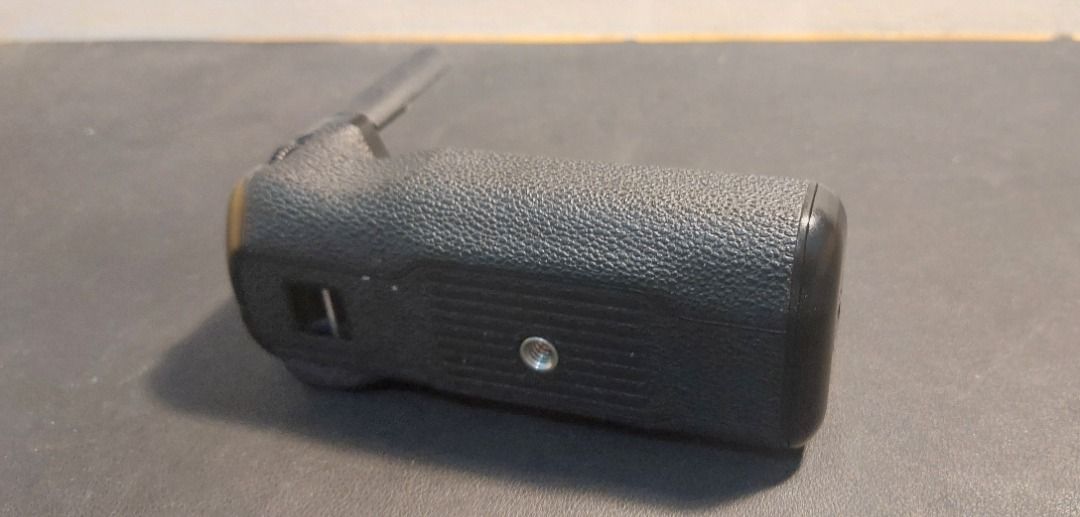 Fujifilm XT2 Vertical Battery Grip (Category: Batteries & Chargers) located in Santa Rosa. Submitted by salicon (Listing ID 1467125526, Image 2). Description: - Compatible with: Fujifilm X-T2 camera - Integrated shutter button, focus joystick, and command dials - Extends battery life and improves vertical shooting ergonomics - Includes Normal/Boost switch on the back - Like new condition, no issues - Negotiable.