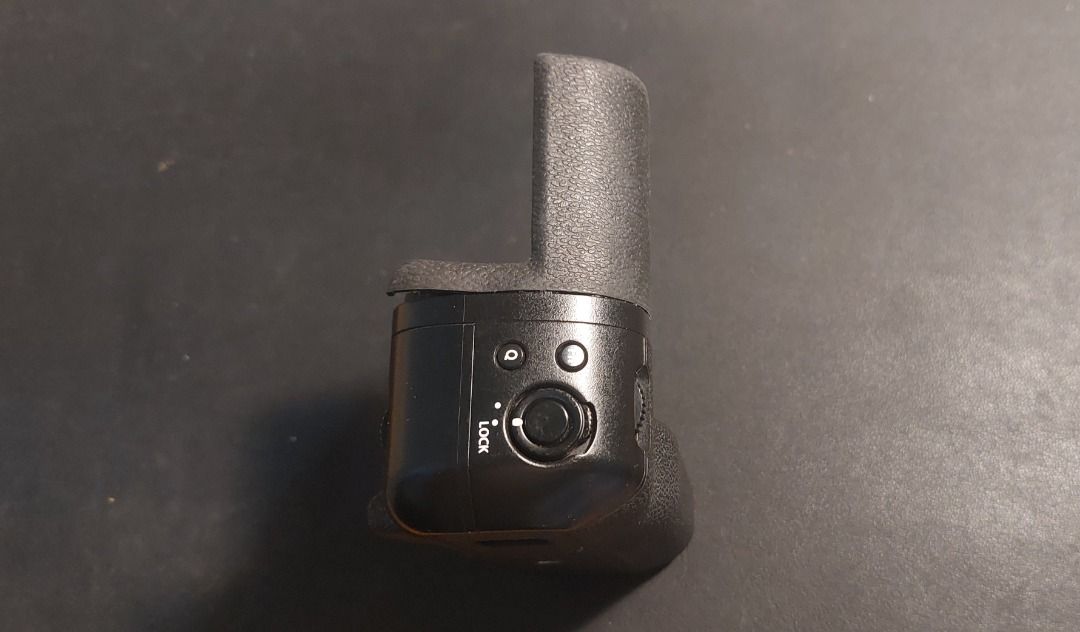 Fujifilm XT2 Vertical Battery Grip (Category: Batteries & Chargers) located in Santa Rosa. Submitted by salicon (Listing ID 1467125526, Image 3). Description: - Compatible with: Fujifilm X-T2 camera - Integrated shutter button, focus joystick, and command dials - Extends battery life and improves vertical shooting ergonomics - Includes Normal/Boost switch on the back - Like new condition, no issues - Negotiable.