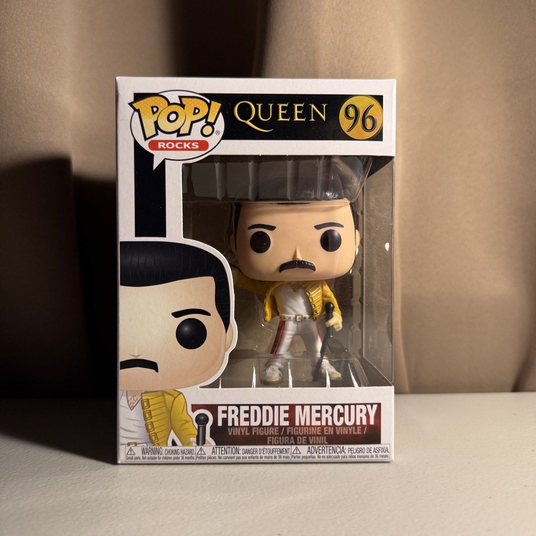 Funko Pop! Rocks: Queen – Freddie Mercury (#96) (Category: Figurines & Statues) located in Manila. Submitted by cheemkenn (Listing ID 1467158975, Image 1). Description: Funko Pop! Rocks: Queen – Freddie Mercury (#96) Selling authentic Funko Pop! Rocks vinyl figure featuring the legendary Freddie Mercury in his iconic yellow jacket outfit from Queen's 1986 Wembley Stadium performance. A iconic centerpiece for Funko Pop collectors or music fans! It
