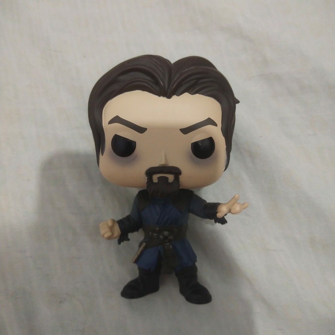 Funko Pop! Sinister Strange (LOOSE/NO BOX) (Category: Character Goods) located in Manila. Submitted by mrswinterstrange (Listing ID 1467129532, Image 1). Description: Occasionally falls but can stand on its own if it is placed on a flat surface at the right angle, so please manage your expectations. No base stand either and has a small scratch on the right eye. There are few dusts also on his hair that can't be removed as seen on the picture. Thi