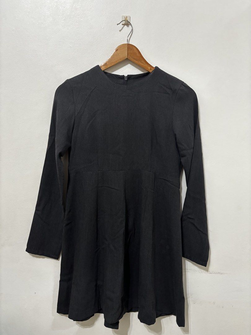 G2000 Dark Gray Long Sleeve Dress (Category: Dresses) located in Makati City. Submitted by maqui0730 (Listing ID 1467035398, Image 1). Description: - Brand: G2000 - Color: Dark Gray - Size: 5 (tag attached near collar) - Design: Long sleeves, crew neckline, fitted bodice, and flared skirt - Closure: Convenient back zipper - Versatility: Ideal for office wear, corporate events, or casual outings.