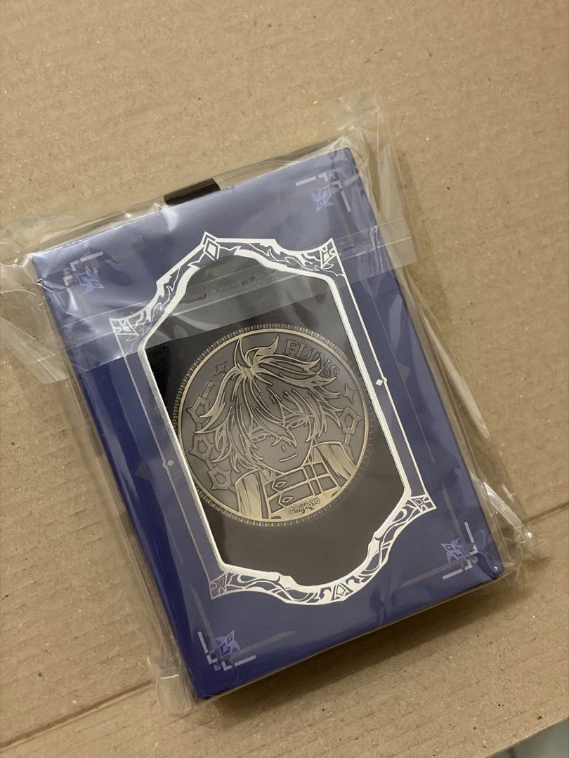 Genshin Impact Flins Decision Coin (Category: Character Goods) located in Mandaluyong City. Submitted by wen.sse (Listing ID 1467157335, Image 1). Description: - Official Genshin Impact Flins Decision Coin - Character: Flins - Item: Decision Coin with Pendant Necklace Condition: Brand new, only opened the plastic.