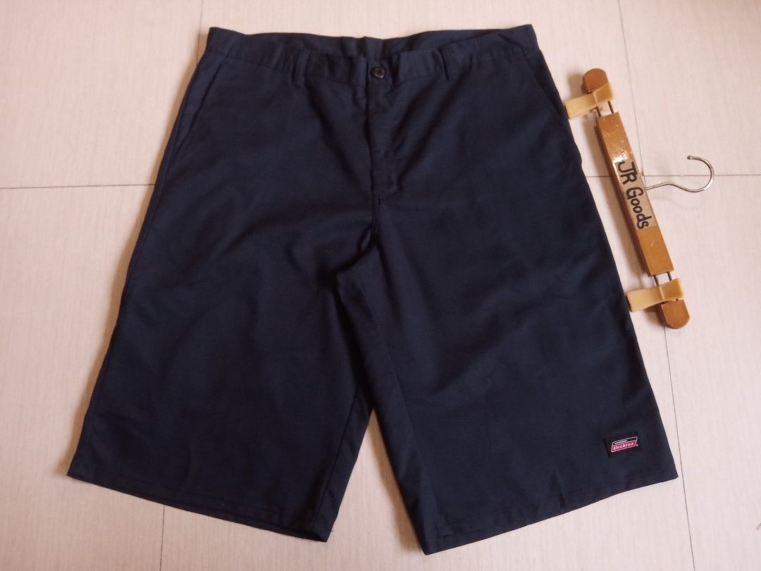 Genuine Dickies Navy Blue Size 36 (Category: Shorts) located in Tanay. Submitted by jrgoods (Listing ID 1467094757, Image 1). Description: Dickies Genuine (Navy blue) Size 36 Length 25 Leg hole 12.5 Good as new condition crispy 750+ship Tanay Rizal location Shipping Nationwide - Size: 36 (inner tag) - Material: 65% polyester, 35% cotton - Closure: Standard button with zipper fly - Features: Multiple utility pockets, rear welt pockets, and signatu