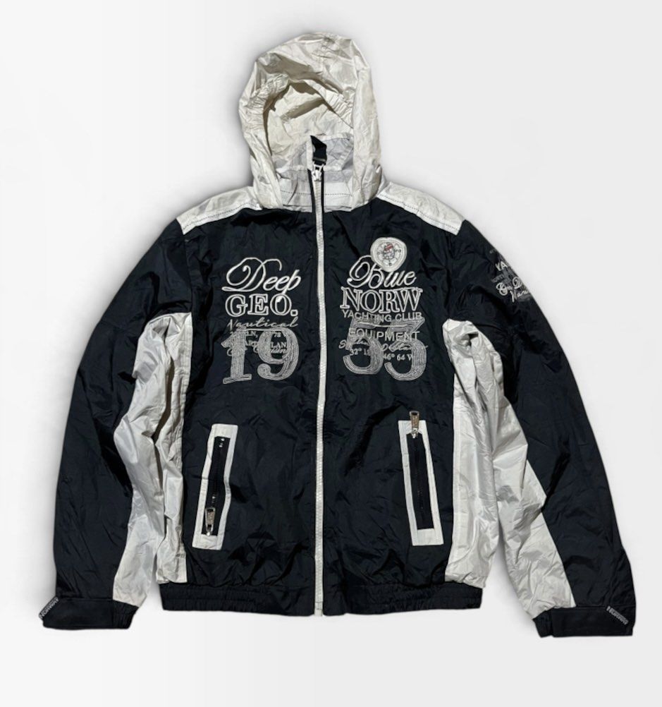 Geographical Norway Bexidor Men 004 Windbreaker Jacket (Category: Coats, Jackets and Outerwear) located in Manila. Submitted by matik6 (Listing ID 1467148270, Image 1). Description: Geographical Norway windbreaker jacket in black and white. Model Bexidor Men 004, size US L / UK 41. Hooded zip-up style with front zippered pockets. Large graphic prints on the front chest and bold nautical graphics inside lining. Great outerwear piece for breezy day