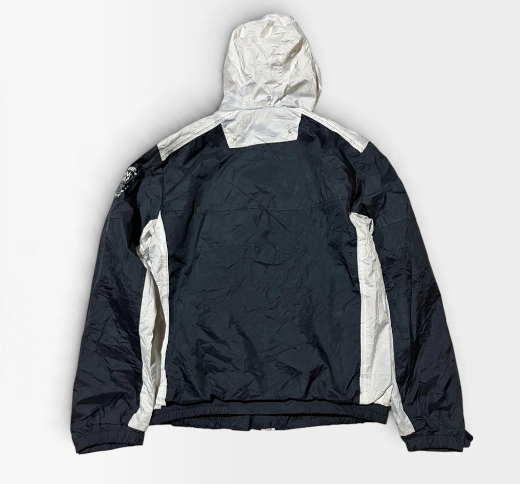 Geographical Norway Bexidor Men 004 Windbreaker Jacket (Category: Coats, Jackets and Outerwear) located in Manila. Submitted by matik6 (Listing ID 1467148270, Image 2). Description: Geographical Norway windbreaker jacket in black and white. Model Bexidor Men 004, size US L / UK 41. Hooded zip-up style with front zippered pockets. Large graphic prints on the front chest and bold nautical graphics inside lining. Great outerwear piece for breezy day