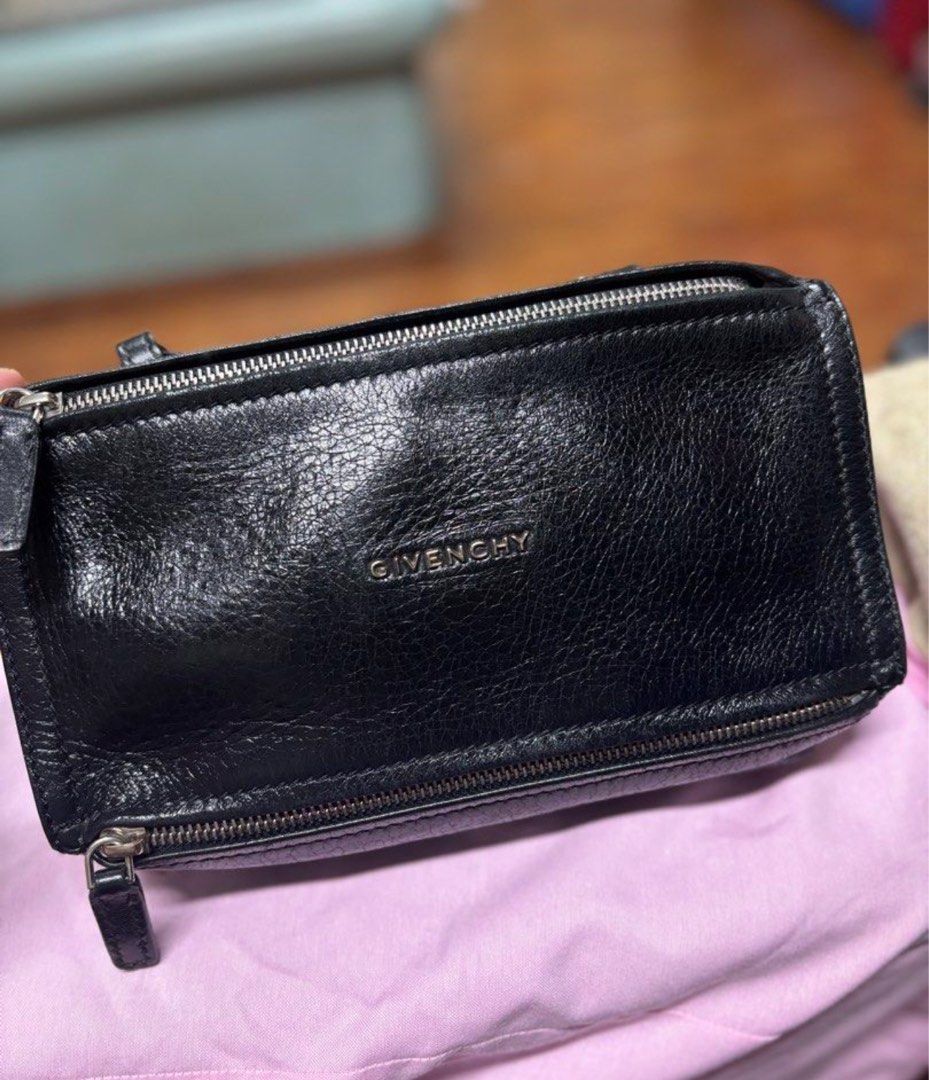 Givenchy Mini Pandora (Category: Luxury Bags & Wallets) located in Makati City. Submitted by tp8904 (Listing ID 1467158502, Image 1). Description: Givenchy Mini Pandora Shiny Lamb Leather 100% authentic Used condition 7/10 *Just to be transparent, the leather has a faint vintage scent, but nothing too strong or overpowering. .
