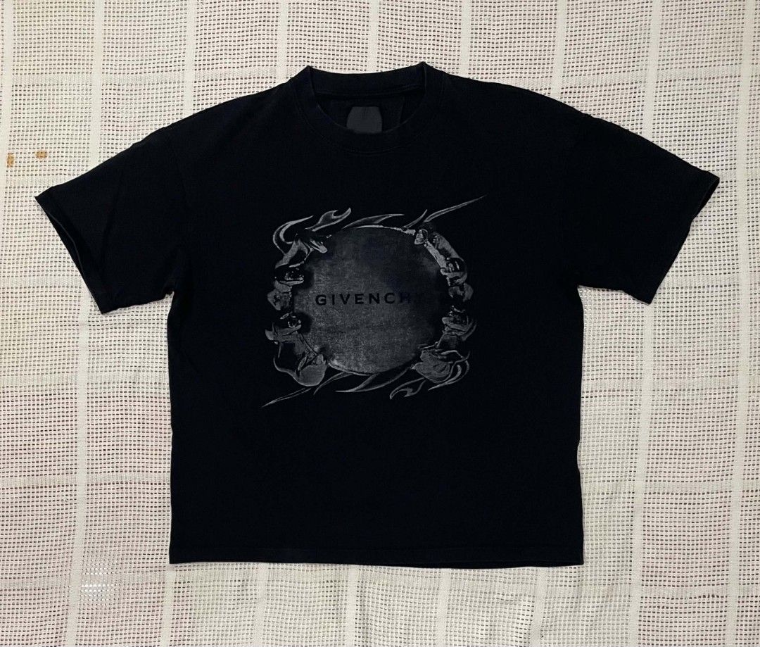 Givenchy Ring Artwork Tee (Category: Luxury Apparel) located in Bacolod City. Submitted by abkicks_apparel (Listing ID 1467132665, Image 1). Description: Givenchy Ring Artwork Tee Size XL on Tag Oversized Fit W23 L27 Excellent Condition No Hidden Issues .
