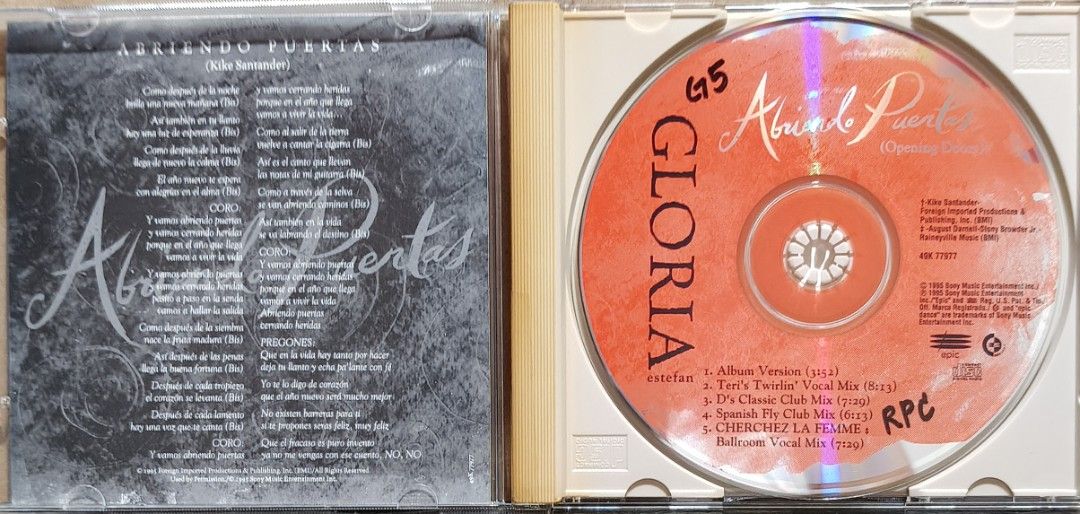 Gloria Estefan - Abriendo Puertas CD (Category: CDs & DVDs) located in Manila. Submitted by ruelcabrer77078 (Listing ID 1467108373, Image 3). Description: - Artist & Title: Gloria Estefan - Abriendo Puertas (1995 Maxi-Single) - Label: Epic Records - Tracklist: Album version plus club mixes (Teri's Twirlin' Vocal Mix, D's Classic Club Mix, Spanish Fly Club Mix) - Inclusions: Jewel case and original lyric insert booklet - Condition: CD surface feat