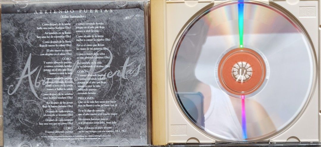Gloria Estefan - Abriendo Puertas CD (Category: CDs & DVDs) located in Manila. Submitted by ruelcabrer77078 (Listing ID 1467108373, Image 2). Description: - Artist & Title: Gloria Estefan - Abriendo Puertas (1995 Maxi-Single) - Label: Epic Records - Tracklist: Album version plus club mixes (Teri's Twirlin' Vocal Mix, D's Classic Club Mix, Spanish Fly Club Mix) - Inclusions: Jewel case and original lyric insert booklet - Condition: CD surface feat