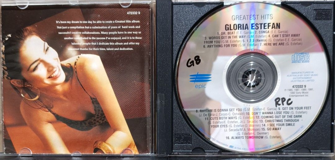 Gloria Estefan Greatest Hits Audio CD Epic Records (Category: CDs & DVDs) located in Manila. Submitted by ruelcabrer77078 (Listing ID 1467110397, Image 3). Description: - Artist/Album: Gloria Estefan Greatest Hits (Epic Records) - Tracklist: Includes 16 classic tracks like Conga, Dr. Beat, Words Get in the Way, and Always Tomorrow - Inclusions: Original jewel case and artwork booklets - Condition: Disc has minor markings in permanent marker on th