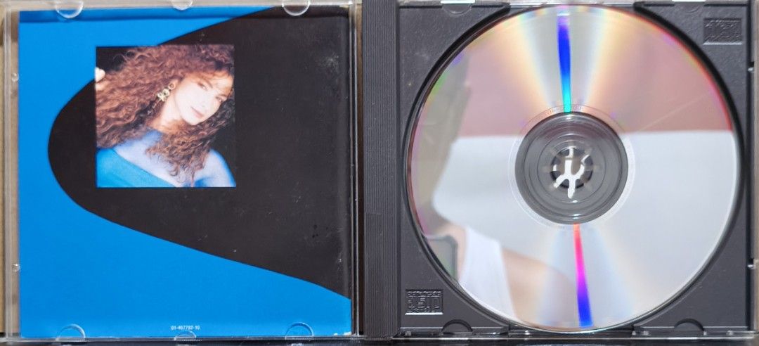 Gloria Estefan Into The Light CD Album (Category: CDs & DVDs) located in Manila. Submitted by ruelcabrer77078 (Listing ID 1467110688, Image 2). Description: - Artist & Album: Gloria Estefan - Into The Light (CD) - Release Year: 1991 (Epic Records) - Hit Track: Includes the smash hit "Coming Out Of The Dark" - Bonus Content: Features special bonus tracks, including the Portuguese version of "Language Of Love" - Packaging: Standard jewel case with 
