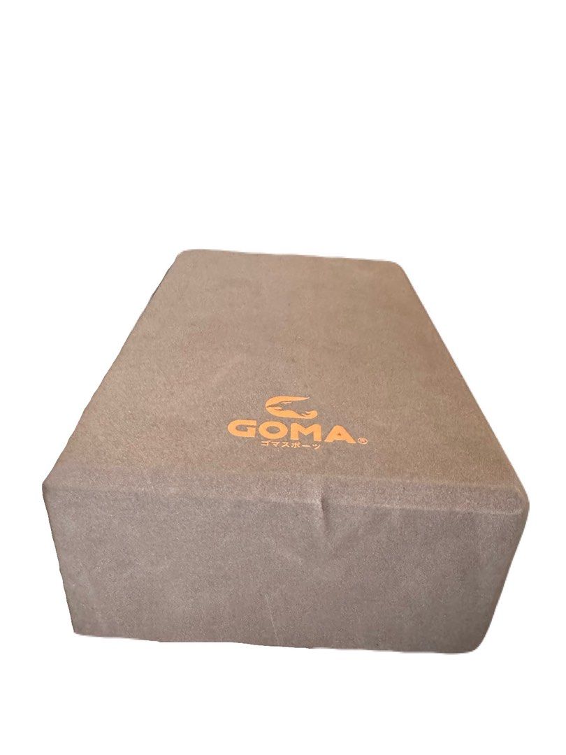 GOMA Yoga Block Exercise Foam Brick 1pc (Category: Toning & Stretching Accessories) located in La Trinidad. Submitted by whatnotcollections (Listing ID 1467066361, Image 3). Description: - Brand: GOMA - Color: Brown with orange brand logo - Material: Dense foam for optimal stretch and stability - Portability: Lightweight and easy to pack in a gym bag - Condition: Clean surface with minimal wear and press marks Made of ultra-light EVA, high-densit