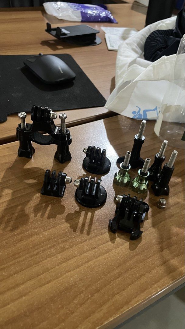 GoPro action camera mount and accessories bundle (Category: Video Cameras) located in Mandaluyong City. Submitted by justinb2007 (Listing ID 1466983238, Image 1). Description: take all 500 loc mandaluyong - Action camera mounts and adapters set - Compatible with GoPro and similar action cams - Includes handlebar mount, curved and flat adhesive bases - Comes with buckle clips, thumb screws, and connecting joints - All pieces included as shown, rea