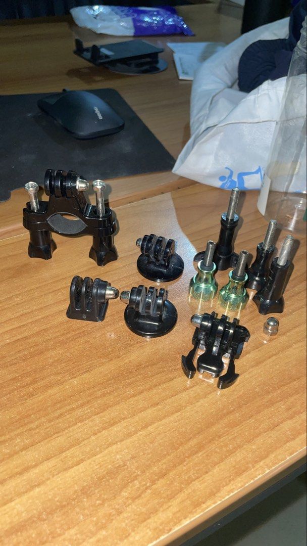 GoPro action camera mount and accessories bundle (Category: Video Cameras) located in Mandaluyong City. Submitted by justinb2007 (Listing ID 1466983238, Image 2). Description: take all 500 loc mandaluyong - Action camera mounts and adapters set - Compatible with GoPro and similar action cams - Includes handlebar mount, curved and flat adhesive bases - Comes with buckle clips, thumb screws, and connecting joints - All pieces included as shown, rea