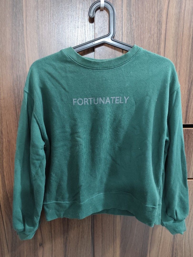 Green 'FORTUNATELY' Crewneck Sweatshirt (Category: Coats, Jackets and Outerwear) located in Cavite. Submitted by zenshub (Listing ID 1467080076, Image 1). Description: Can fit to medium..