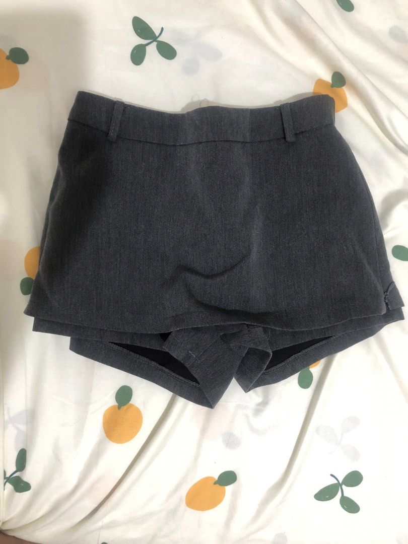 Grey Skort with Built-In Shorts (Category: Skirts) located in Quezon City. Submitted by maggie.styles (Listing ID 1467129889, Image 1). Description: - Color: Grey - Style: High-waist skort with front skirt overlay and built-in shorts - Closure: Side zipper - Details: Belt loops and two back faux welt pockets.