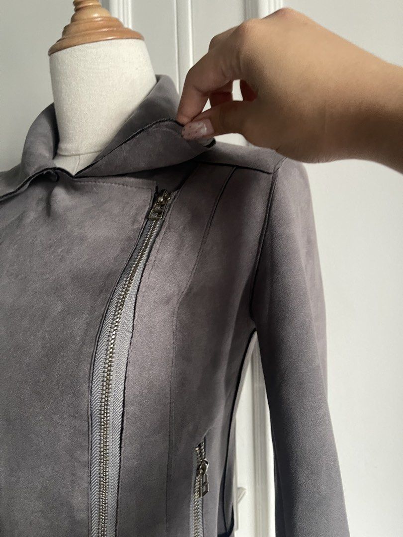 [SOLD] Grey Suede Biker Jacket with Belt (Category: Coats, Jackets and Outerwear) located in Cavite. Submitted by devilourea (Listing ID 1467062200, Image 3). Description: - Color: Grey - Material: Soft faux suede - Closure: Asymmetrical front zipper with matching chest and side zippers - Details: Wide collar, lapels, and built-in waist belt with buckle - Styling: Great for layering over basic tops.