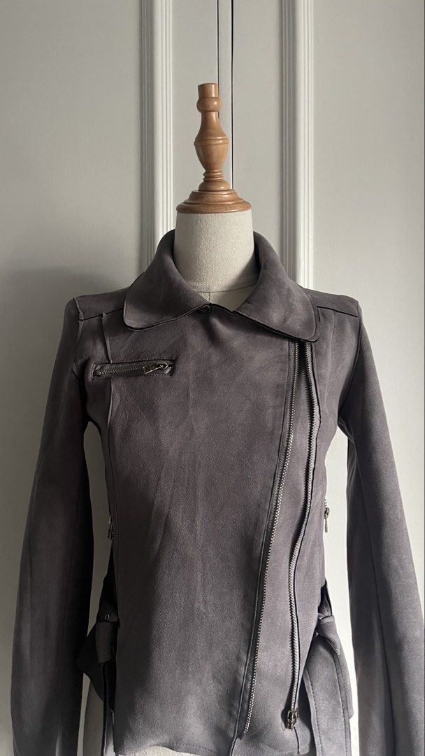 [SOLD] Grey Suede Biker Jacket with Belt (Category: Coats, Jackets and Outerwear) located in Cavite. Submitted by devilourea (Listing ID 1467062200, Image 2). Description: - Color: Grey - Material: Soft faux suede - Closure: Asymmetrical front zipper with matching chest and side zippers - Details: Wide collar, lapels, and built-in waist belt with buckle - Styling: Great for layering over basic tops.